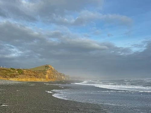 Gemstone Beach in May looking back to the carpark from the other side of the Taunoa Stream